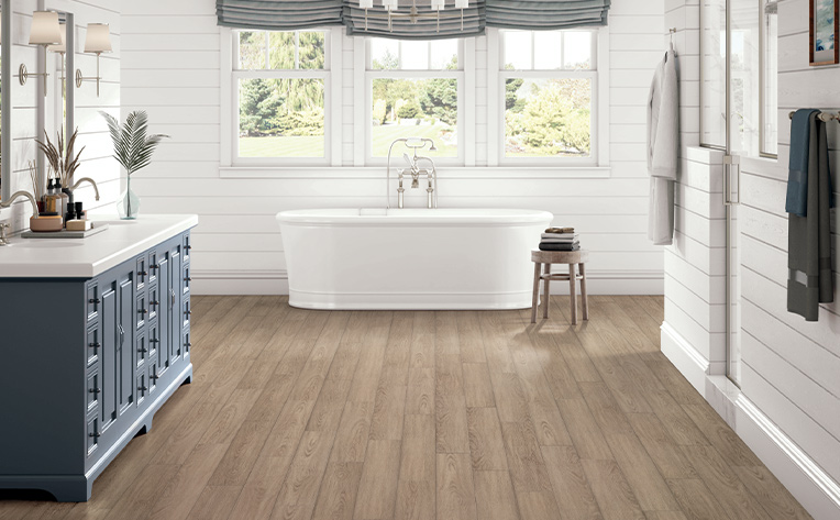 luxury vinyl bathroom tub blue cabinet